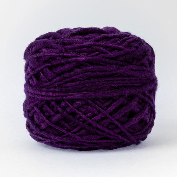 100% merino wool deep purple colour ball of yarn