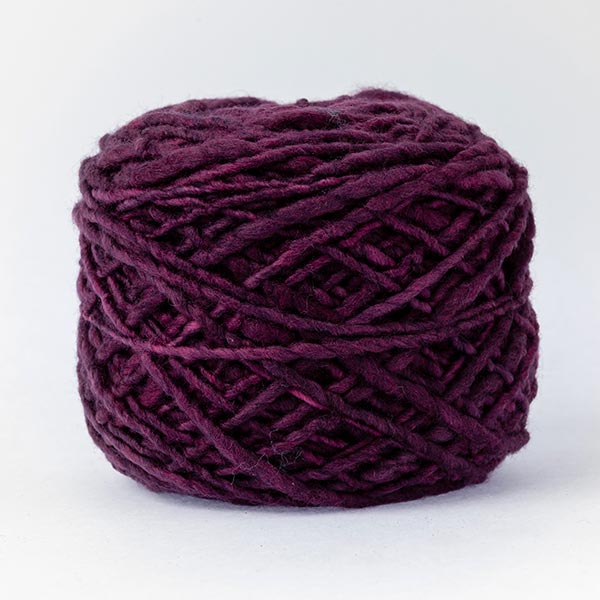 100% merino wool plum deep purple colour ball of yarn