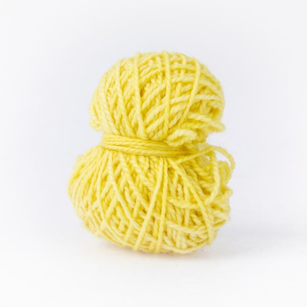 Small yellow duckling balls of wool