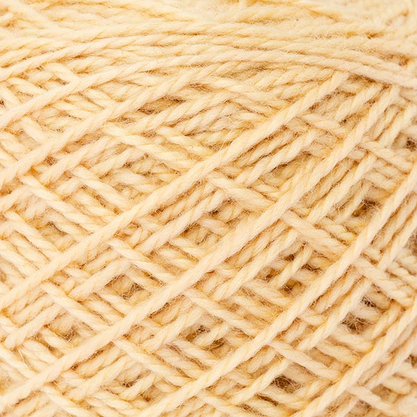 Texture image of cream yellow mini ball of wool