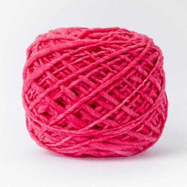 100% merino wool cerise pink ball of wool