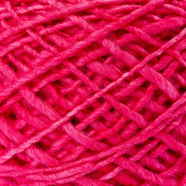 100% merino wool cerise pink ball of wool texture detail