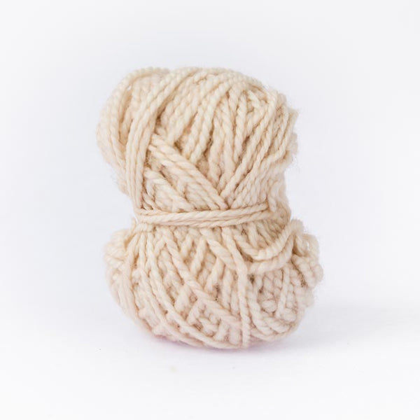 Light sand mini moon ball of yarn